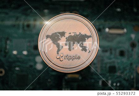 bronze Ripple coin, on background of computer bronze Ripple coin, on background of computer 55293372