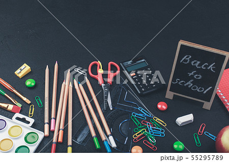 School supplies on black board background colorful back to school 55295789