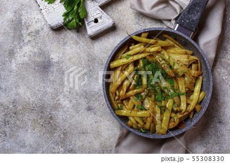 Stewed yellow wax beans in pan Stewed yellow wax beans in pan 55308330