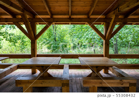 Wooden Shelter With Tables in Park Wooden Shelter With Tables in Park 55308432