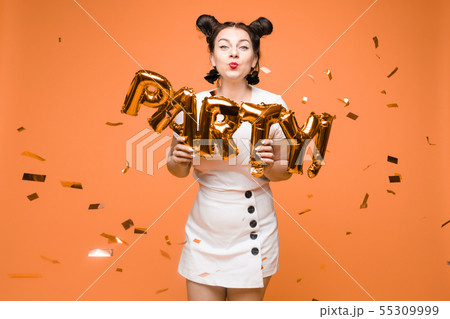 portrait of beautiful woman celebrating a party 55309999