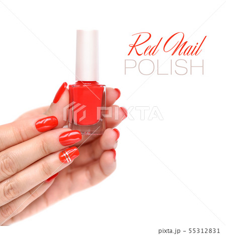 Hands of a woman with red manicure and nail polish Hands of a woman with red manicure and nail polish 55312831