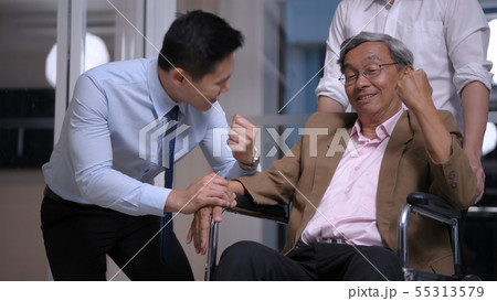 Health concept. Young men encourage old people in 55313579