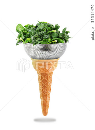 Delicious ice cream cone with spinach taste 55314470