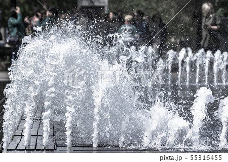 Spray fountain in the wind 55316455