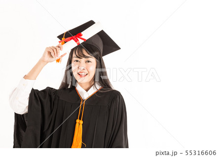 Graduated Asian woman in cap and gown on white Graduated Asian woman in cap and gown on white 55316606