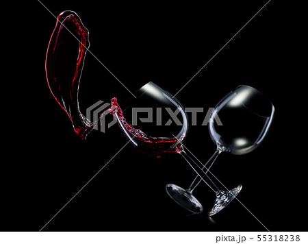 Set of empty glasses for red wine with splashes in a row isolated on black background. Set of empty glasses for red wine with splashes in a row isolated on black background. 55318238