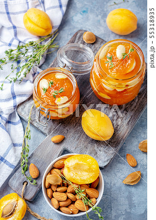 Delicious apricot jam with thyme and almonds. Delicious apricot jam with thyme and almonds. 55318935