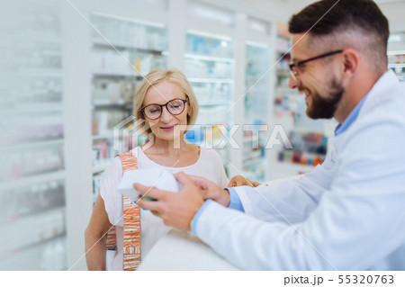 Positive delighted people talking about modern pills 55320763