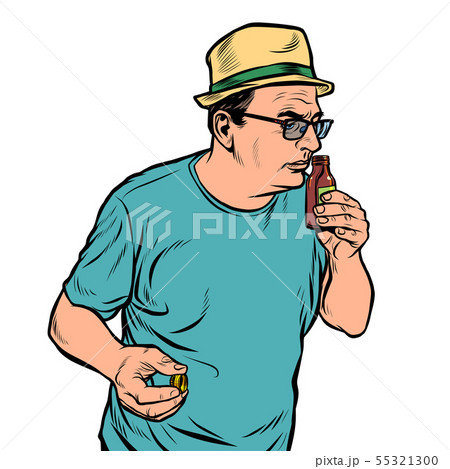a man sniffs a bottle. perfume or medicine 55321300