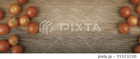 Group cherry tomatoes place on the wooden table Group cherry tomatoes place on the wooden table 55323230