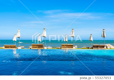 Beautiful outdoor nature landscape with bed deck chair around swimming pool in hotel resort Beautiful outdoor nature landscape with bed deck chair around swimming pool in hotel resort 55327053