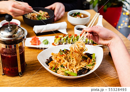 couple eating in thea asian restaurant couple eating in thea asian restaurant 55328493