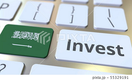 INVEST text and flag of Saudi Arabia on the buttons on the computer keyboard. Business related INVEST text and flag of Saudi Arabia on the buttons on the computer keyboard. Business related 55329191