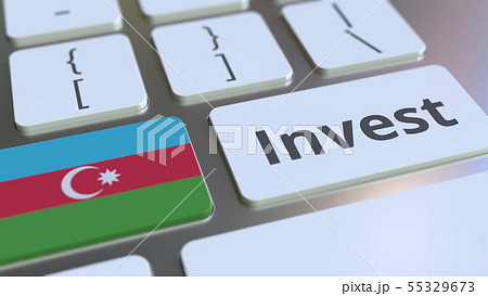 INVEST text and flag of Azerbaijan on the buttons on the computer keyboard. Business related 55329673