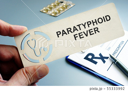 Man holding plate with sign Paratyphoid fever. Man holding plate with sign Paratyphoid fever. 55333992