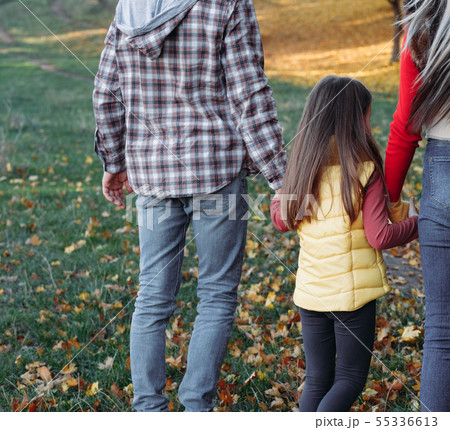 fall leisure parents daughter walking nature park fall leisure parents daughter walking nature park 55336613