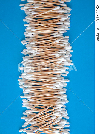 Composition of wooden cotton swabs on a Composition of wooden cotton swabs on a 55337438