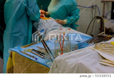 Surgical instruments on table for operation with Surgical instruments on table for operation with 55339553