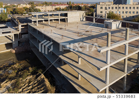 Building construction site work against house Building construction site work against house 55339683