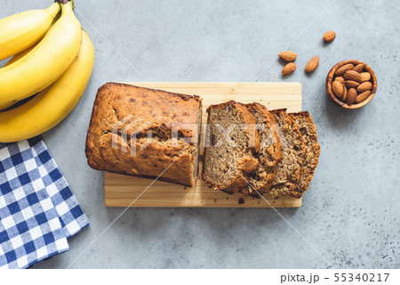 Banana bread with nuts on concrete table background Banana bread with nuts on concrete table background 55340217
