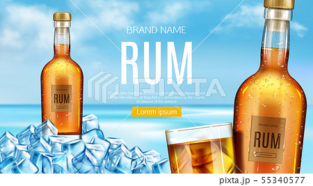 Rum bottle and glass stand of heap of ice cubes 55340577
