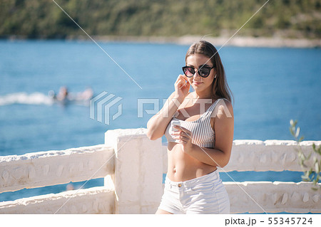 Young sport woman use wireless headphones for listening music until she running in the morning on Young sport woman use wireless headphones for listening music until she running in the morning on 55345724