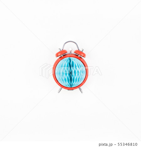 Red alarm clock with blue paper ball concept Red alarm clock with blue paper ball concept 55346810