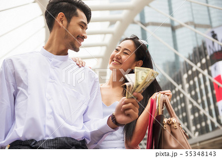 Myanmar couple shopping in city 55348143