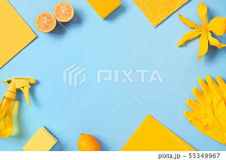Blue background with cleaning supplies and lemons Blue background with cleaning supplies and lemons 55349967