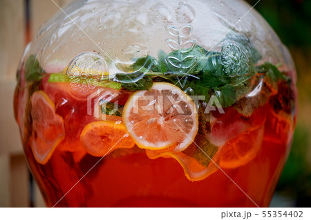 Refreshing lemonade in a steamed-up can. Picnic, catering at the event. 55354402