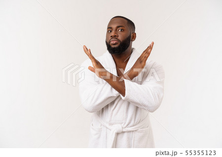 Portrait shock and annoyed displeased young man raising hands up to say no stop right there isolated 55355123