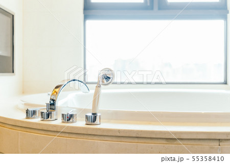 Beautiful luxury bathtub decoration in bathroom interior Beautiful luxury bathtub decoration in bathroom interior 55358410