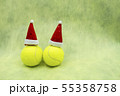 Tennis Christmas with Santa hat on yellow backgrou 55358758