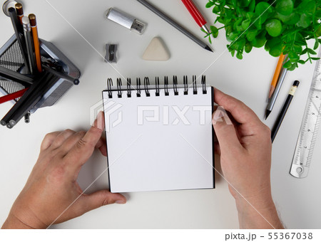 Human hand with pencil  55367038