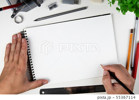 Human hand with pencil  55367114