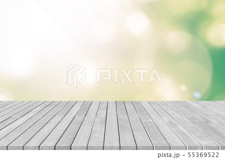 Wooden floor with blurred nature background yellow Wooden floor with blurred nature background yellow 55369522