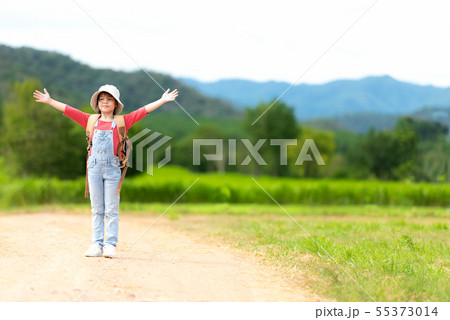 Asian girl children raise arms and standing 55373014