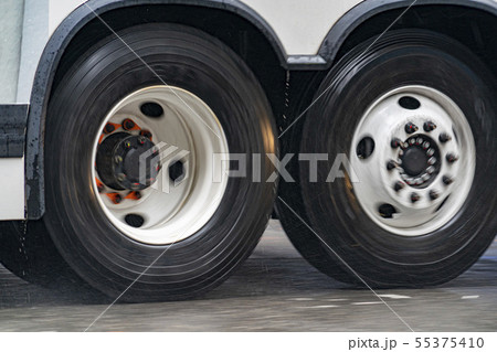 coach bus tire detail while raining in new york 55375410