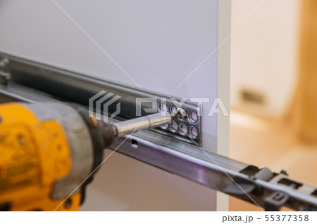 Handyman service in the process of assembling Handyman service in the process of assembling 55377358