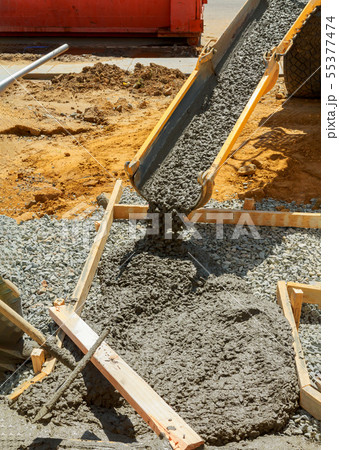 Worker working for concrete pavement for ground Worker working for concrete pavement for ground 55377474