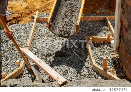 Building new concrete pavement for paving walkway. 55377475
