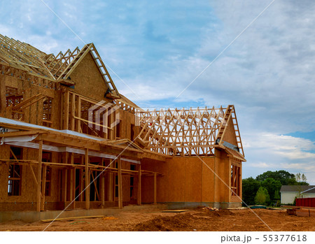 Unfinished wood frame building or framing beam of 55377618