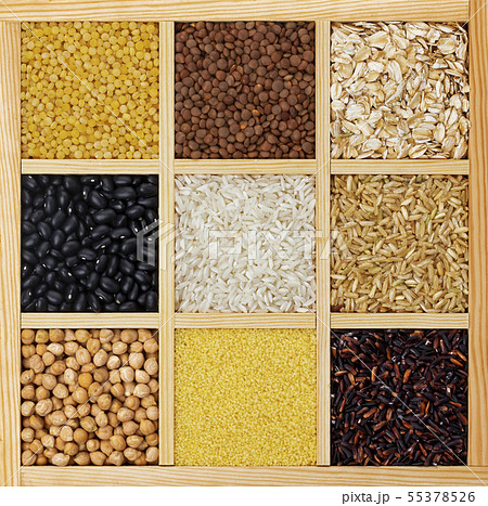 Dry cereals, groats and beans in wooden box top view Dry cereals, groats and beans in wooden box top view 55378526