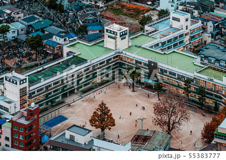 Aerial view school buildings in residential area 55383777
