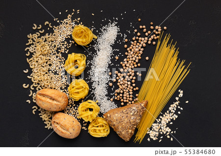 Creative flat lay of healthy food full of carbohydrates on black Creative flat lay of healthy food full of carbohydrates on black 55384680