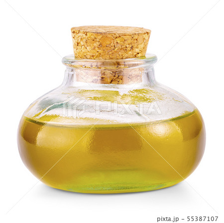 The Small oil glass bottle with a cork isolated on 55387107