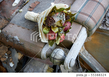 Bunch of rotten fruit and wilted flowers 55388324
