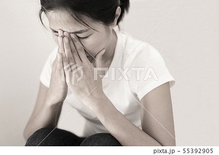 The depression woman alone sitting on staircase. 55392905