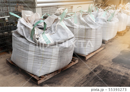 Collected area of used waste powder in big bags 55393273